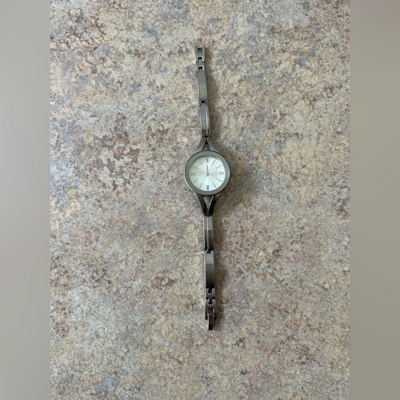 5/$25 Laura Scott silver bangle like watch. Cute and easy to wear. Pre-owned - Picture 2 of 6